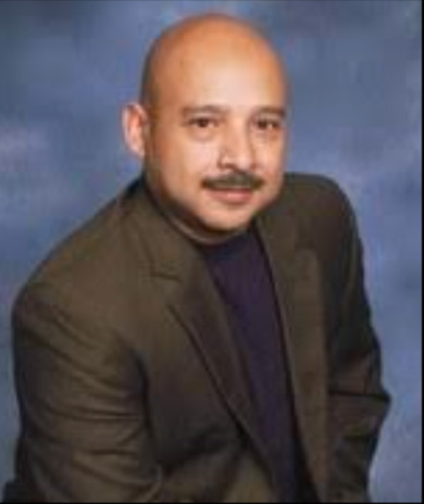 Rev. Sam Flores District Superintendent Rev. Sam Flores District Superintendent